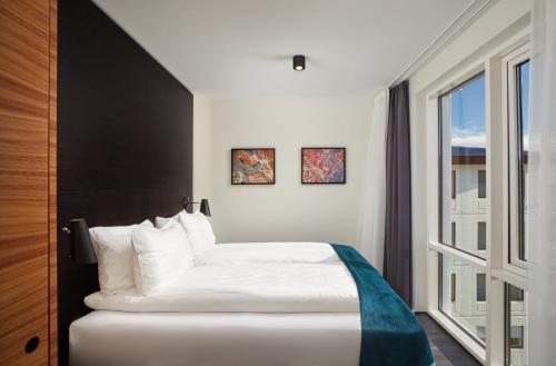 Ein Bett oder Betten in einem Zimmer der Unterkunft Hotel Örk