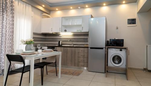 Xenia_Apartments A6にあるキッチンまたは簡易キッチン