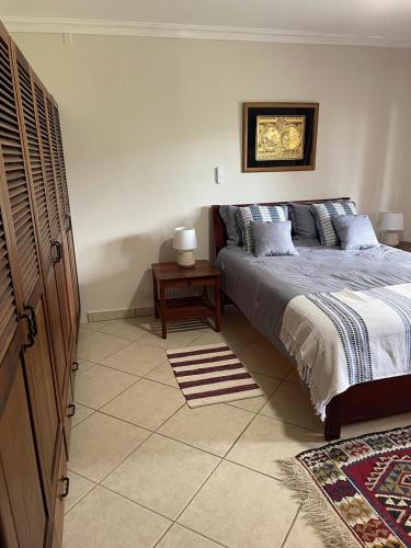 Ένα ή περισσότερα κρεβάτια σε δωμάτιο στο Cosy Rental Unit in Valle Escondido Boquete