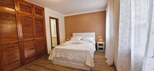 Ένα ή περισσότερα κρεβάτια σε δωμάτιο στο Calma en la Laguna