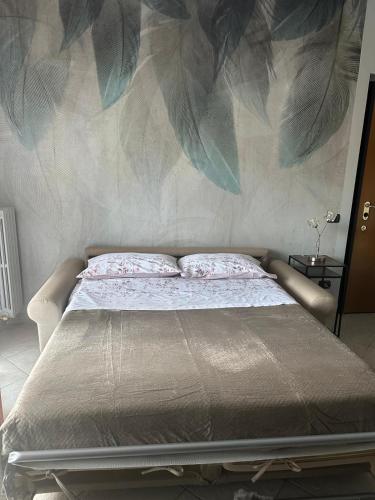 Postel nebo postele na pokoji v ubytování NoemiHouse