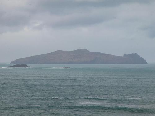 a large body of water with an island in the distance at Barr na hAille in Dunquin