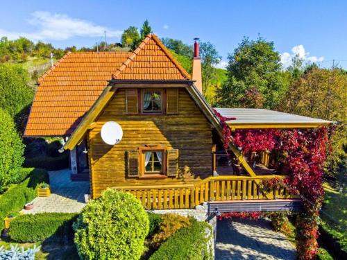 a model of a house with a porch at House Grga in Gornja Voća