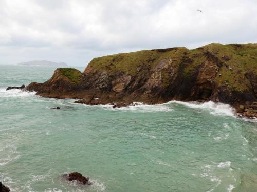 a view of the ocean with a rocky coastline at Barr na hAille in Dunquin