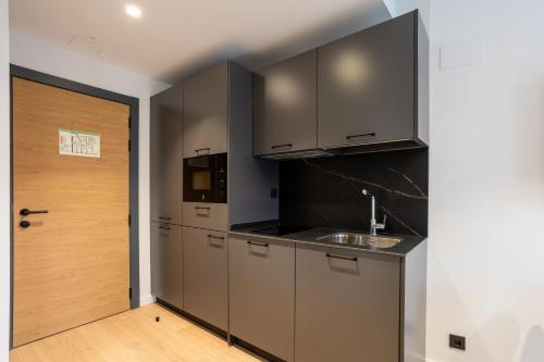 Una cocina o zona de cocina en Be10 Suites, Bermeo