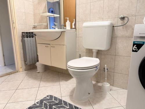 O baie la Apartments Nives