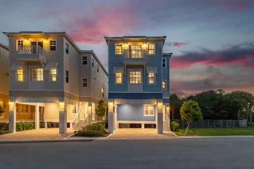 a large blue building with a sunset in the background at Hideaway #23 in Key Largo