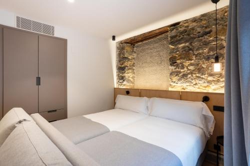 Cama o camas de una habitación en Be10 Suites, Bermeo