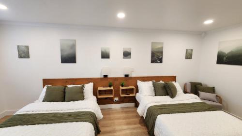 Postel nebo postele na pokoji v ubytování Hygge Hus Hotel