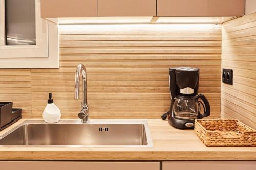 Η κουζίνα ή μικρή κουζίνα στο Calypso Apartment