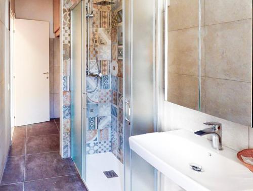 a bathroom with a sink and a shower at Bellagio, Como Lake Breva - Como Lake in Bellagio