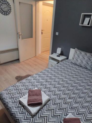 Una cama o camas en una habitación de Vrnjacki apartmani