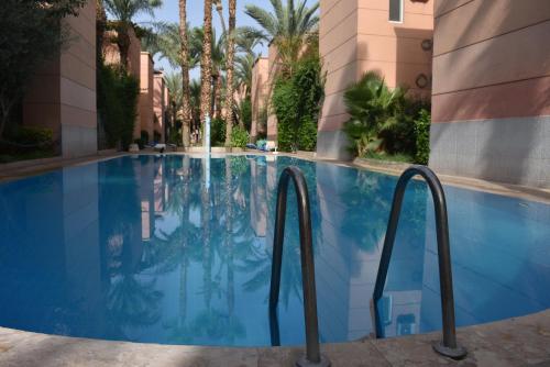 Bazén v ubytování Riad butterfly Marrakech nebo v jeho okolí
