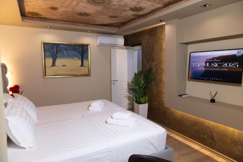 Postel nebo postele na pokoji v ubytování 4R Colombo Hotel