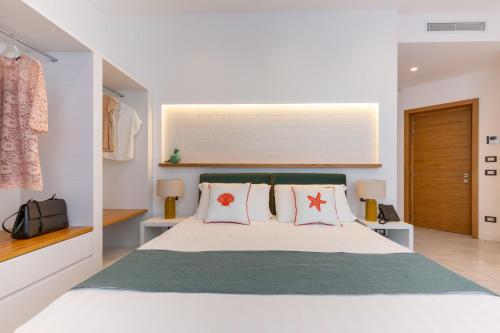 Ein Bett oder Betten in einem Zimmer der Unterkunft Gioì Hotel Sorrento