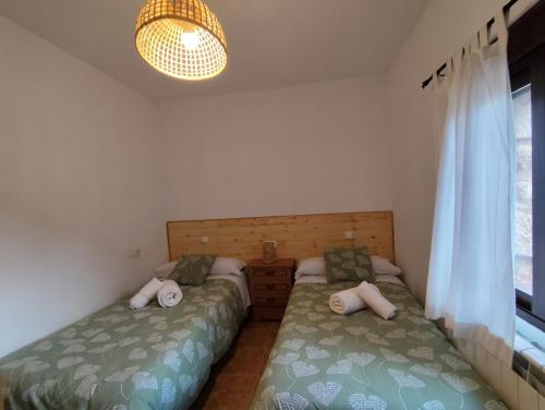 Postel nebo postele na pokoji v ubytování CR La Carrasca