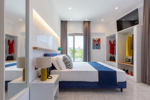 Postel nebo postele na pokoji v ubytování Gioì Hotel Sorrento