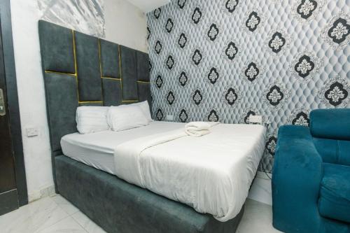 Postel nebo postele na pokoji v ubytování Clazz Hotel