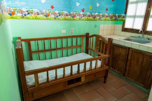 a bunk bed in a kitchen with a sink at Hotel La Posada del Sol in Granada