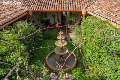 Κήπος έξω από το Hotel La Posada del Sol