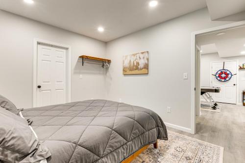 Una cama o camas en una habitación de Renovated Logan Home with Pond and Fire Pit
