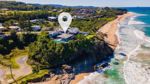an aerial view of a beach with a hot air balloon at Osprey -Spectacular Location, Luxe, Pool Views in Sapphire Beach