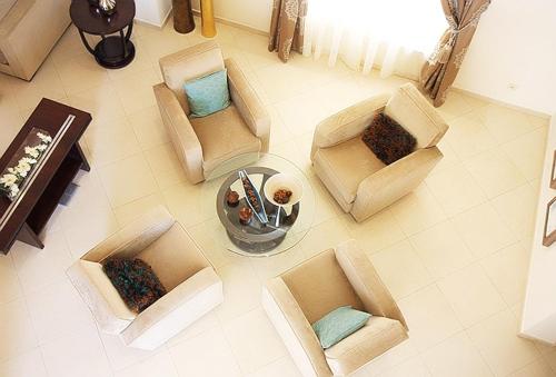 an overhead view of a living room with chairs and a table at Vivienda Hotel Villas in Riyadh