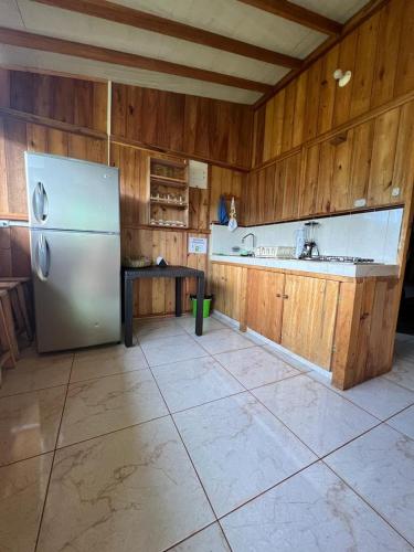 Кухня или мини-кухня в Cabañas Villa Juliana
