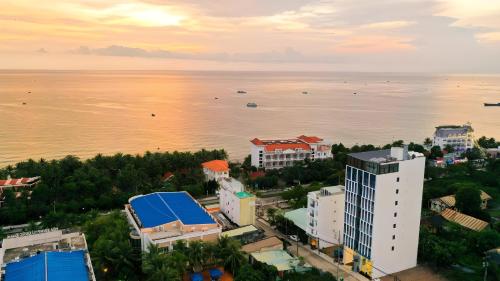 an aerial view of a city and the ocean at Stellar Phú Quốc - Hotel in Phu Quoc
