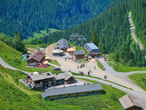 an aerial view of a village on a mountain at Alpine Retreat w Sauna in Abondance