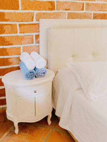 Ein Bett oder Betten in einem Zimmer der Unterkunft Hotel Kalma