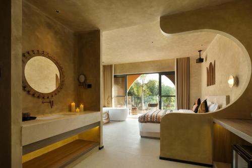 Posezení v ubytování Xishuang Banna Wild Reverie Lodge