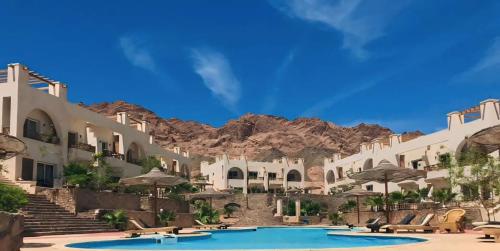 La alberca dentro o cerca de Dahab Dolphin