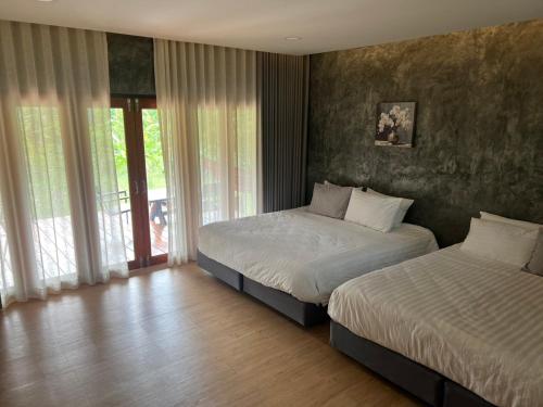 Katil atau katil-katil dalam bilik di maksaihomestay
