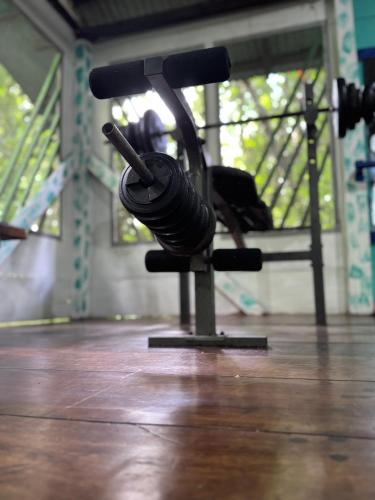 a chair with a bunch of weights on it at Finca Tatin Hotel in Lámpara