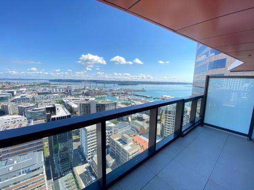 a view of the city from the top of a building at Gorgeous Seaview and Harbour View 2 BDR 2 BTH Apartment in Auckland