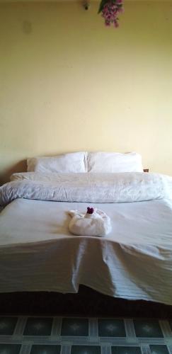 Postel nebo postele na pokoji v ubytování Gaurav Homestay