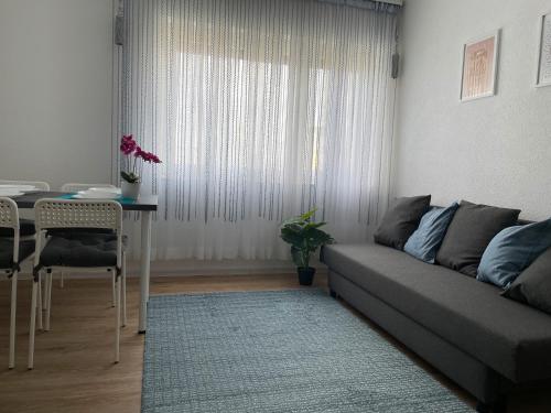 Zona de estar de Neue Orchideen-apartments Im Haus