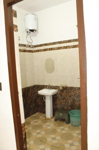 Koupelna v ubytování Hotel Hare Krishna Vrindavan