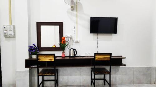 TV a/nebo společenská místnost v ubytování SaBai Backpacker Hostel