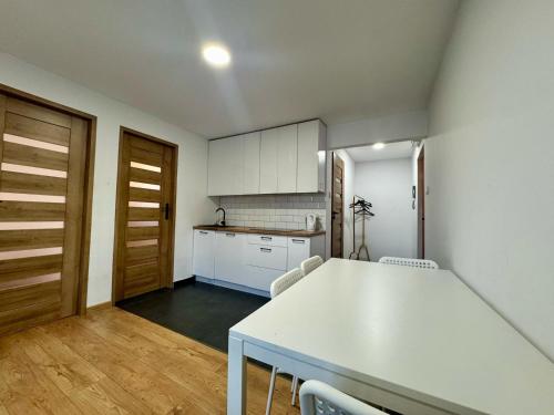 Η κουζίνα ή μικρή κουζίνα στο Apartament Bałandy 26
