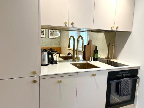 Η κουζίνα ή μικρή κουζίνα στο Old Town Luxury Apartment