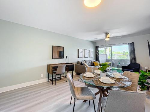 a living room with a table and a couch at Cordova Arms By Rocketstay in Fort Lauderdale