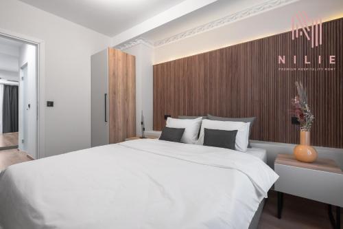 Katil atau katil-katil dalam bilik di Esther Suites, Nilie Hospitality MGMT