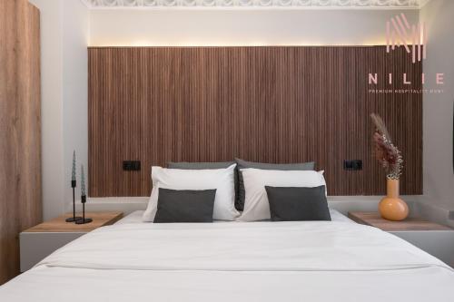Katil atau katil-katil dalam bilik di Esther Suites, Nilie Hospitality MGMT
