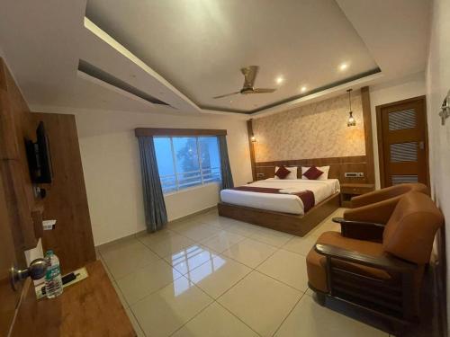 Postel nebo postele na pokoji v ubytování Vue Dale Retreats Munnar