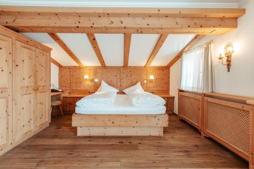 Postel nebo postele na pokoji v ubytování Biohotel Schweitzer