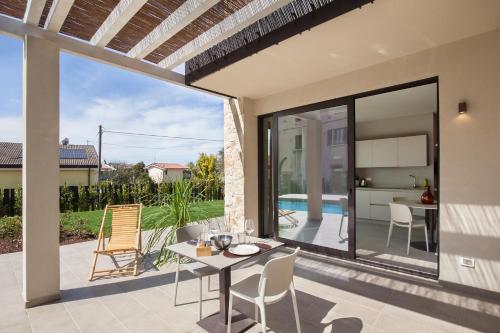 Un balcón o terraza en Villa Carlotta Rosmarino