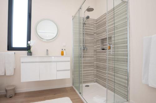 a bathroom with a shower and a sink at Villa La Perla by LovelyStay in Paul do Mar