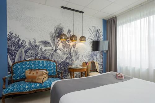 Postel nebo postele na pokoji v ubytování Hôtel Le Grand Barnum